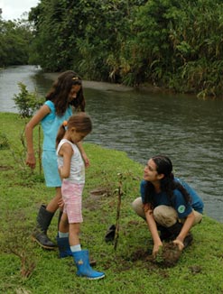 Girls Planting a Tree